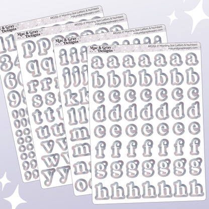 A mockup of four journalling sticker sheets containing letters and numbers. Each letter or number is white, surrounded by a light celestial style print. Each sticker is individually cut around the character.